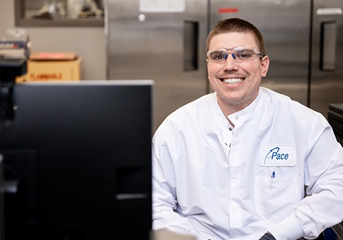 Pace Scientist working in laboratory. Product stewardship, Regulatory compliance service, Regulatory Compliance Services, Material data management, California Proposition 65, reach and rohs